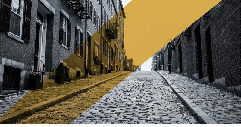 Cobblestone Beacon Hill lane bisected by a diagonal band of ochre